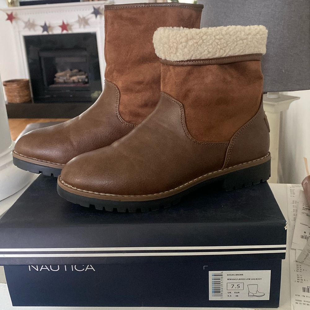 Brown leather boots. Never worn.